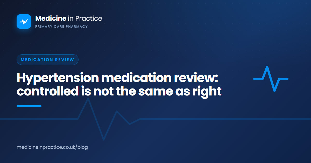 GP practice pharmacist measuring an older patient's standing blood pressure during a hypertension review